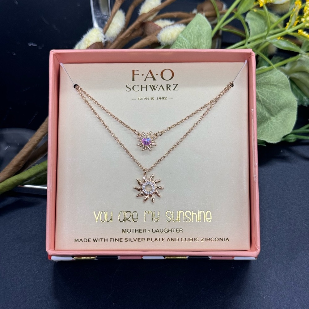 FAO Schwarz Crystal Sun Pendant 2 Pc Necklace Set
